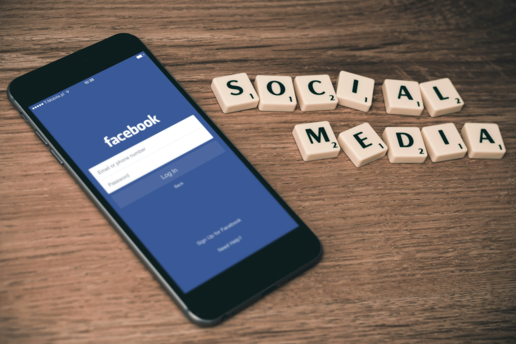 a mobile phone on a table with the words 'social media'